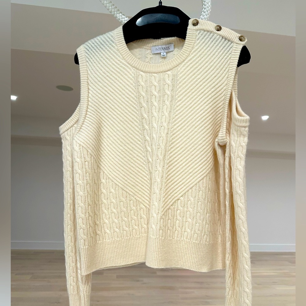 Intermix cream Terry “cold shoulder” cable knit wool sweater